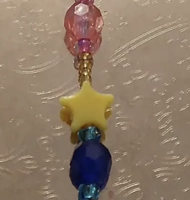 Star Bead Charm: Pink, yellow and blue beads